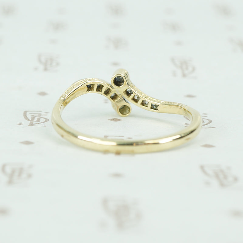vintage diamond platinum and gold crossover ring back view