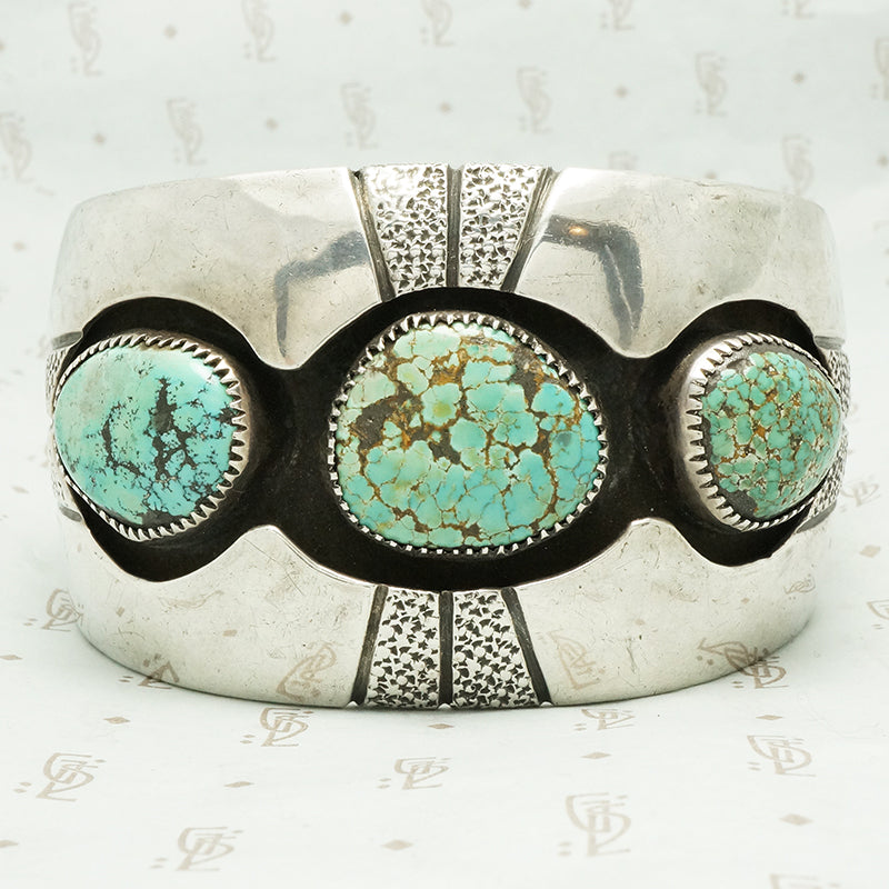 3 chunks of royston turquoise shadow set in coin silver cuff