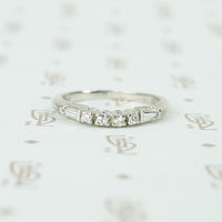 baguette and round diamond curved platinum band 1940's