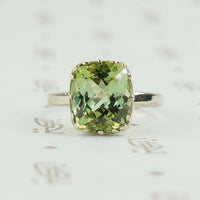 cushion cut pale green tourmaline white gold ring
