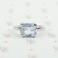 light grey blue sapphire in platinum