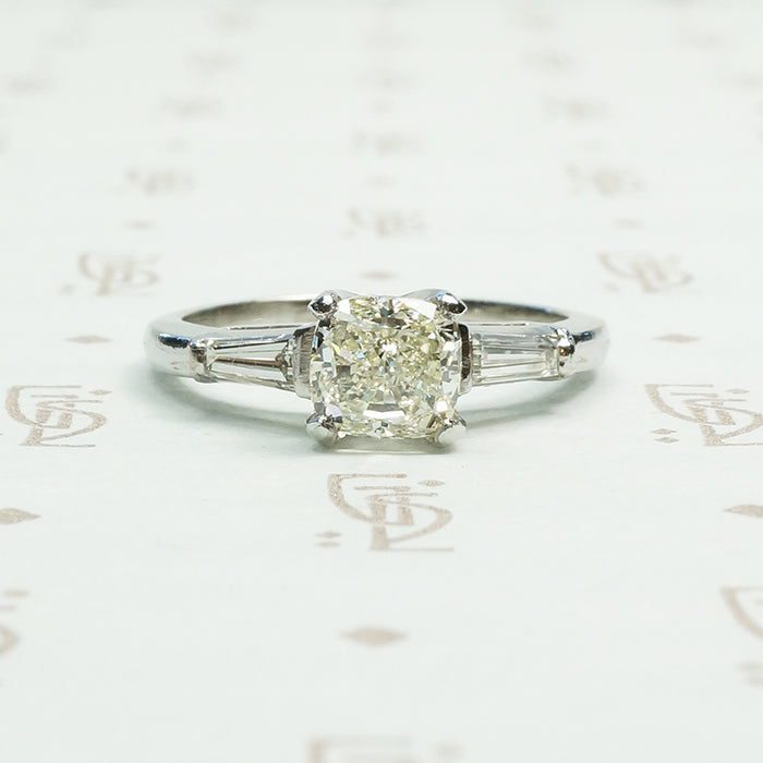 1 carat pale yellow brilliant cushion cut diamond in classic platinum setting circa 1950