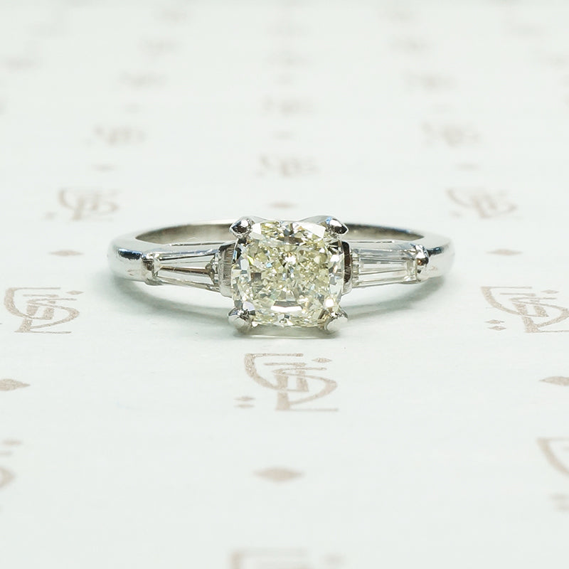1 carat pale yellow brilliant cushion cut diamond in classic platinum setting circa 1950
