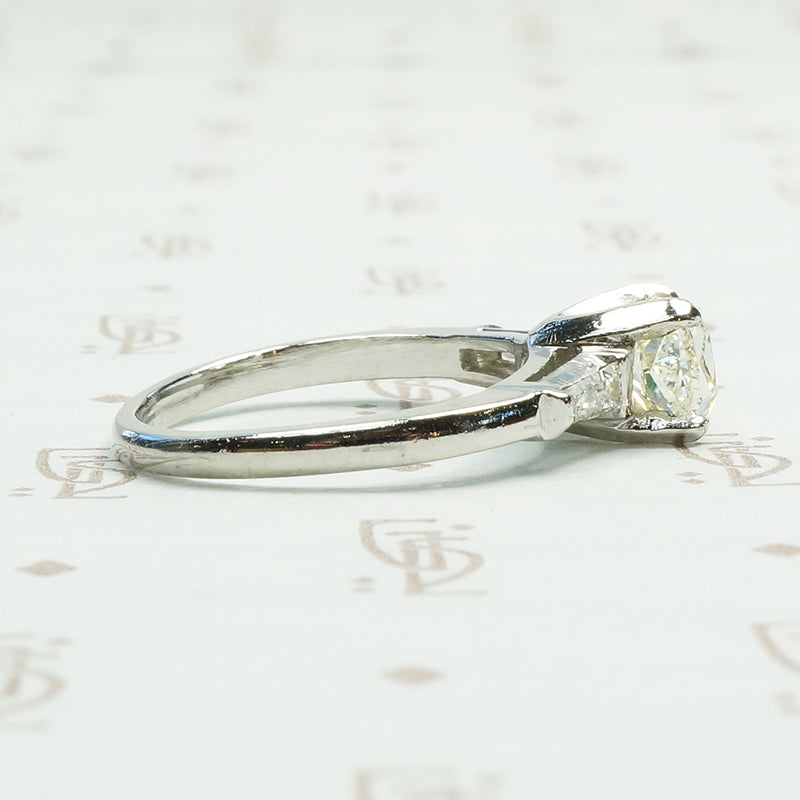 1 carat pale yellow brilliant cushion cut diamond in classic platinum setting circa 1950