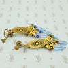 Czchoslovakian art glass and brass screw back earrings back view