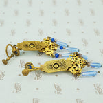 Czchoslovakian art glass and brass screw back earrings back view