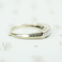 side detail of 1940's wedding band showing knife edge and fish tail details
