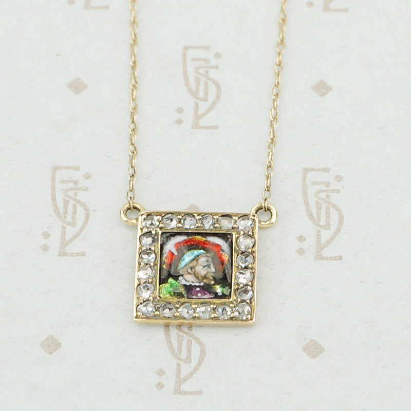 gold enamel and rose cut diamond necklace close up