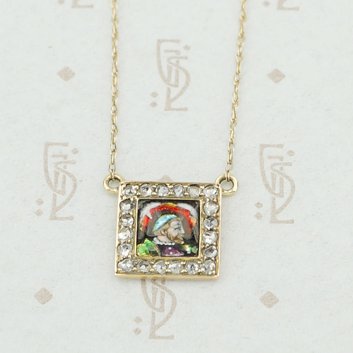 gold enamel and rose cut diamond necklace close up