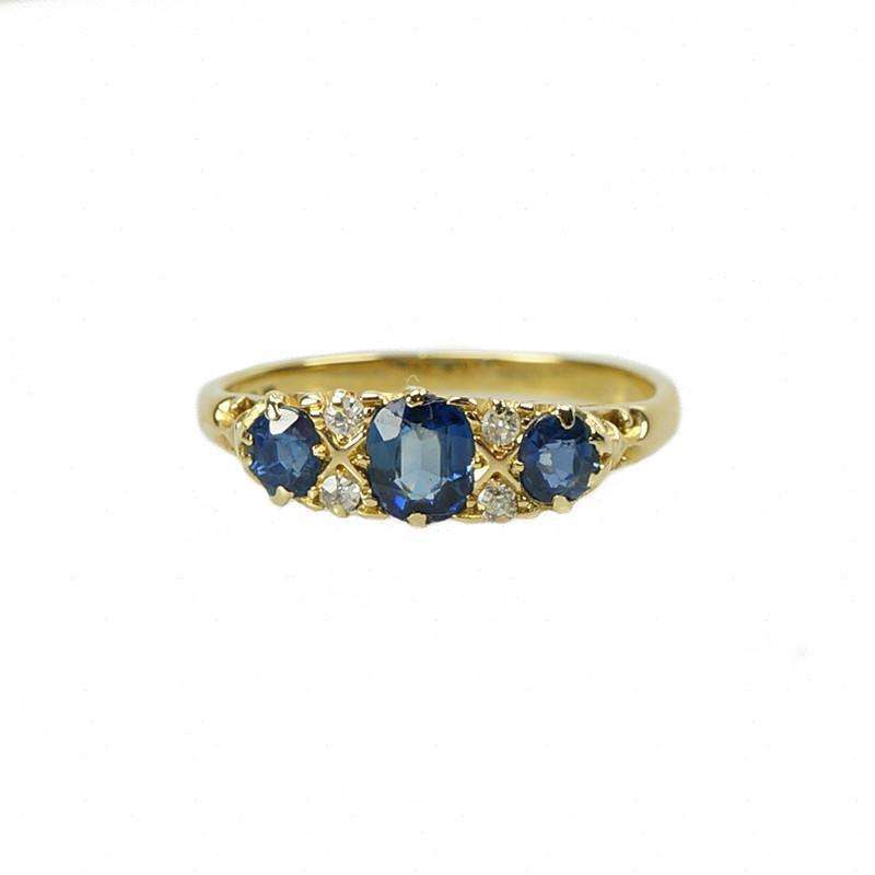 Oval Sapphires and Diamond Ring