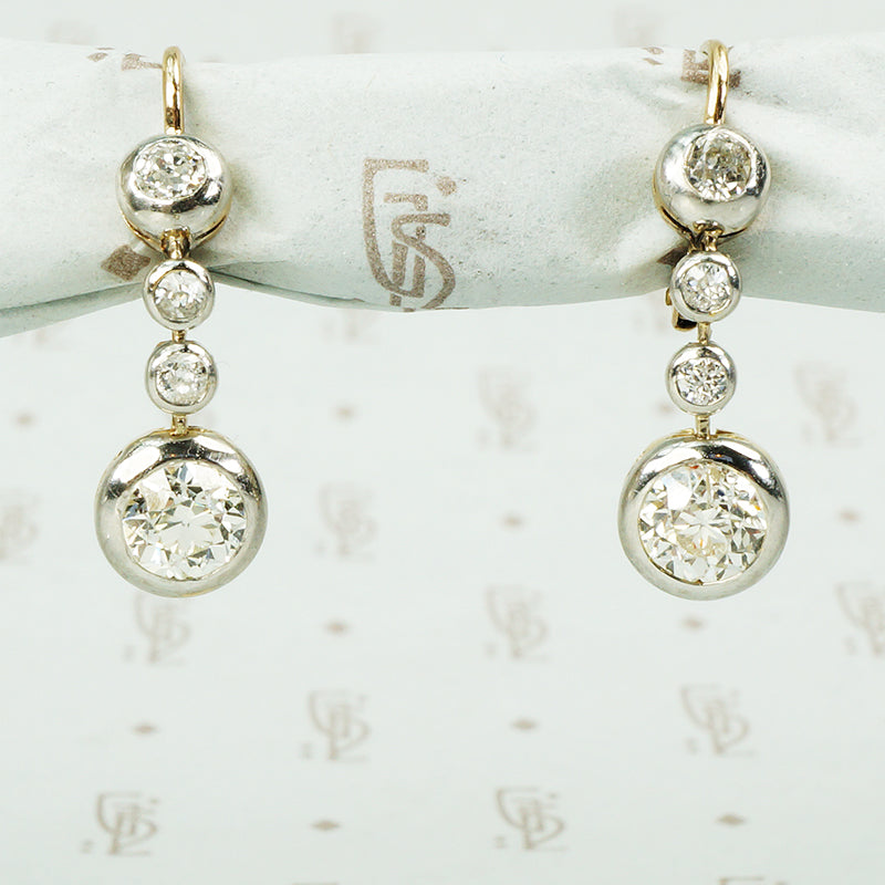 antique diamond drop earrings in platinum on 14k yellow gold