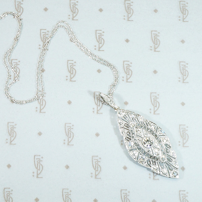 edwardian platinum filigree diamond set pendant circa 1900