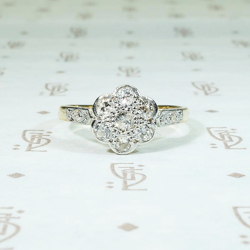 Floral Cluster Ring with Diamond-Set Shoulders
