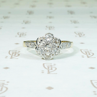 Floral Cluster Ring with Diamond-Set Shoulders
