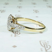 Floral Cluster Ring with Diamond-Set Shoulders