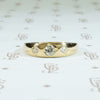 three diamond 18k yellow gold gypsy band