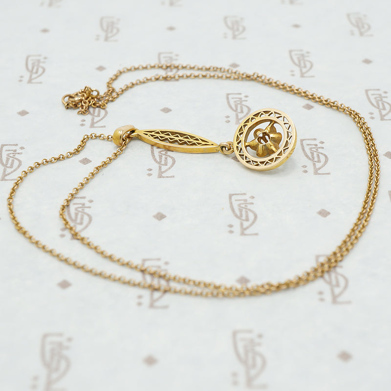 back view of 14k gold and diamond lavalier