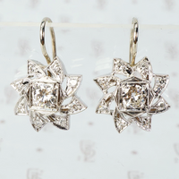 vintage 1940's 4k white gold and diamond pinwheel shaped earrings
