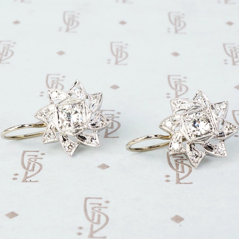 vintage 1940's 4k white gold and diamond pinwheel shaped earrings