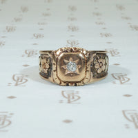elaborately decorated victorian cigar band set with omc diamond and covered in tri color gold flowers