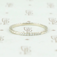 The diamond wheat band by 720 in white gold.