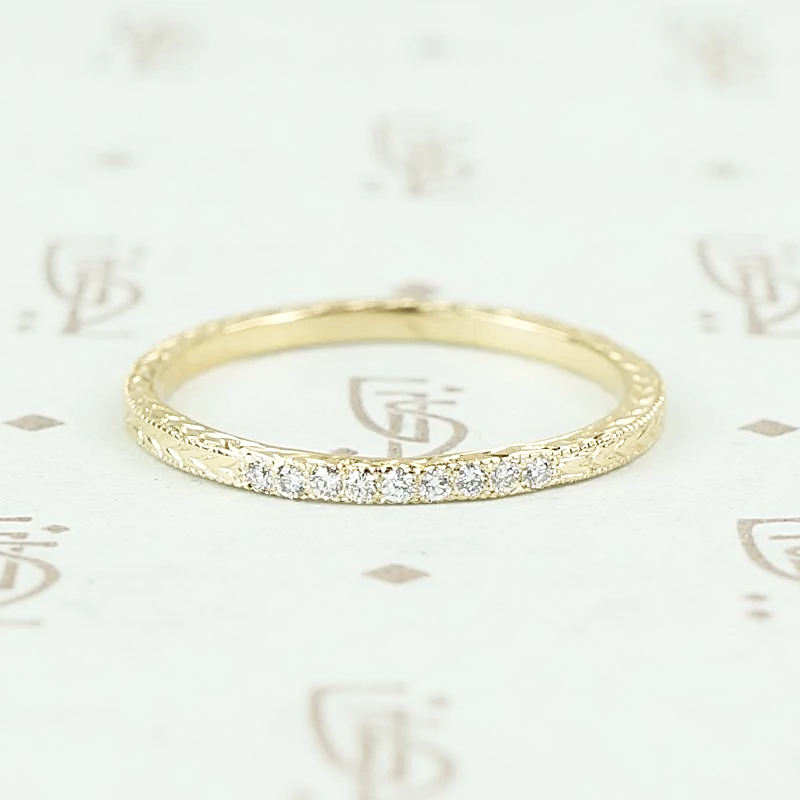 The diamond wheat band by 720 in yellow gold.