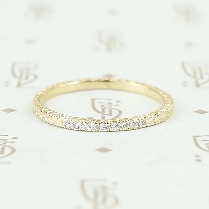 The diamond wheat band by 720 in yellow gold.