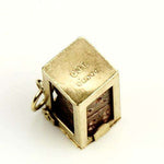 9k Gold Charm Dice in a cage London 1956