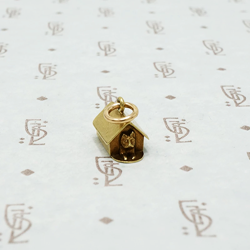 gold dog house charm