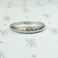 double row of tiny twinkly star set diamonds band