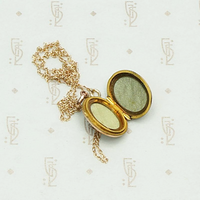 Two Tone Edwardian Locket with Graphic Details, interior view.
