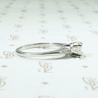 Elegant Mid Century Engagement Ring with Baguettes