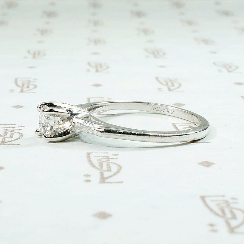 Elegant Mid Century Engagement Ring with Baguettes