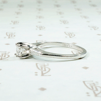 Elegant Mid Century Engagement Ring with Baguettes