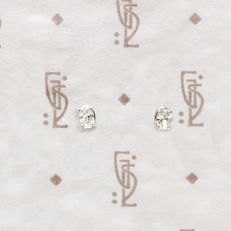 Sparkling Little Oval Cut Diamond Stud Earrings
