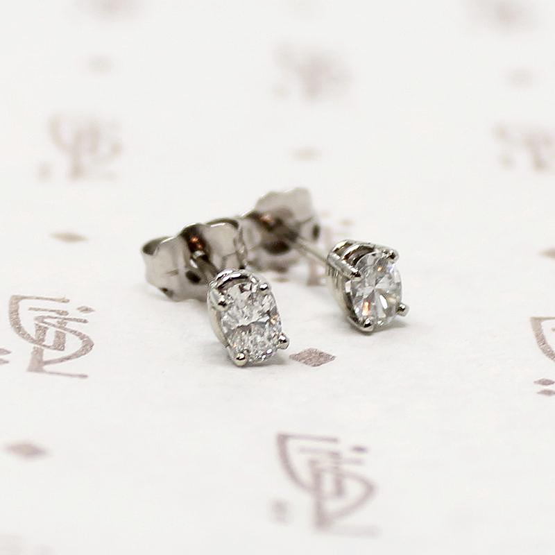 Sparkling Little Oval Cut Diamond Stud Earrings