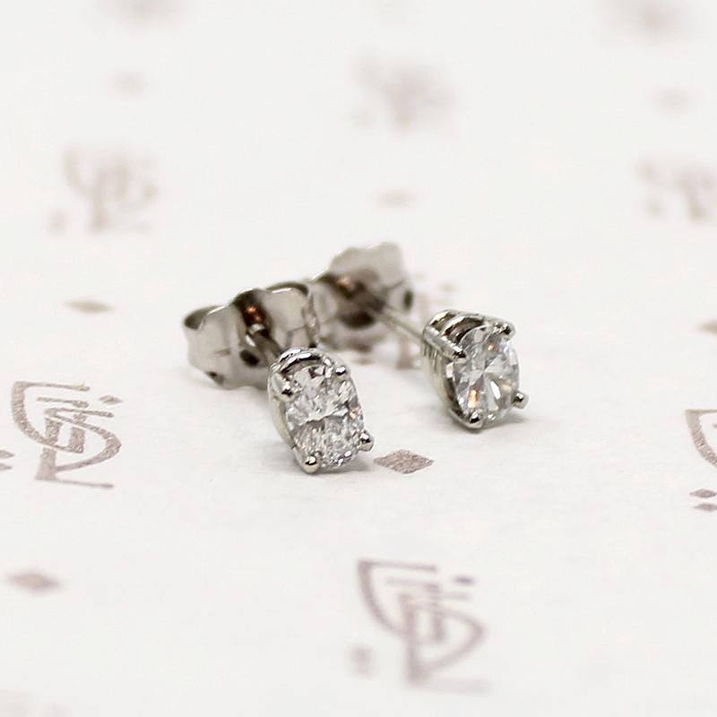 Sparkling Little Oval Cut Diamond Stud Earrings