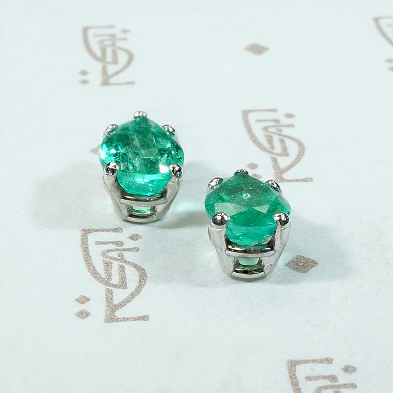 Vivacious Pear Cut Emerald Studs in Platinum
