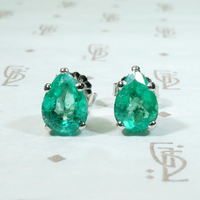 Vivacious Pear Cut Emerald Studs in Platinum