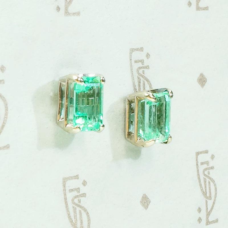 Lush Green Emerald Stud Earrings in White Gold
