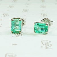 Lush Green Emerald Stud Earrings in White Gold