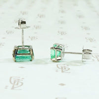 Lush Green Emerald Stud Earrings in White Gold