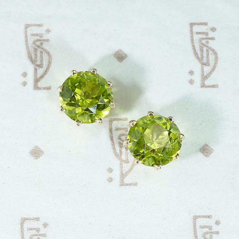 Glowing Green Peridot Studs in Gold Martini Settings