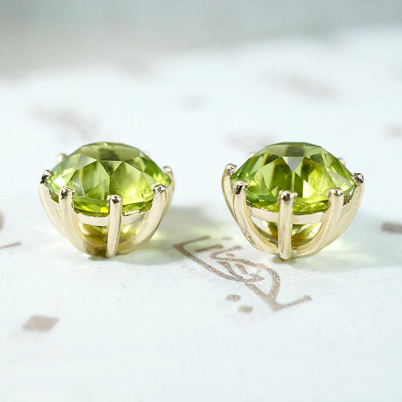 Glowing Green Peridot Studs in Gold Martini Settings