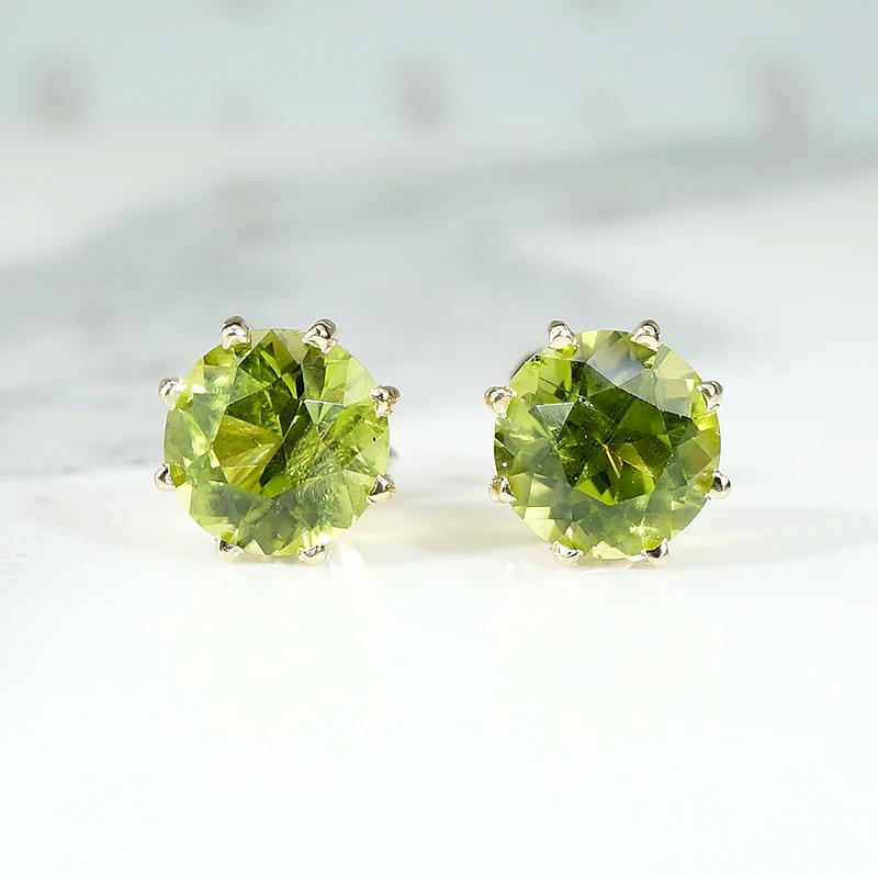 Glowing Green Peridot Studs in Gold Martini Settings