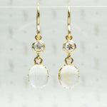 Vintage moonstone earrings with .22tcw vintage diamonds in 14k gold