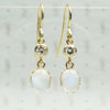 vintage moonstones in their original 11k settings with vintage diamonds and recycled ear wirs