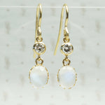 vintage moonstones in their original 11k settings with vintage diamonds and recycled ear wirs