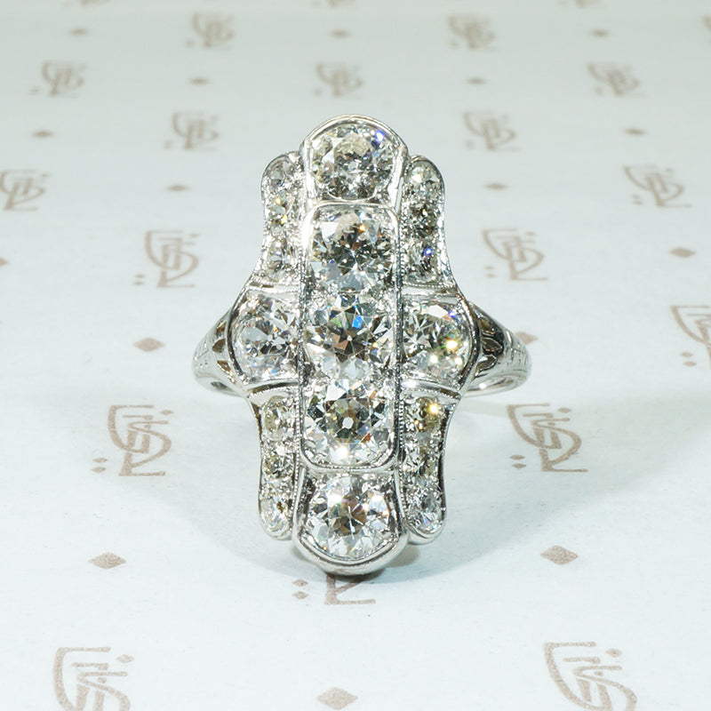 3.15tcw oec platinum and diamond knuckle ring circa 1915