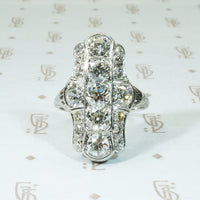 3.15tcw oec platinum and diamond knuckle ring circa 1915